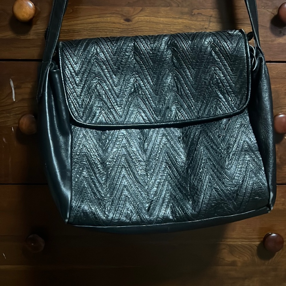 Jacobsons Made in Italy black leather purse.